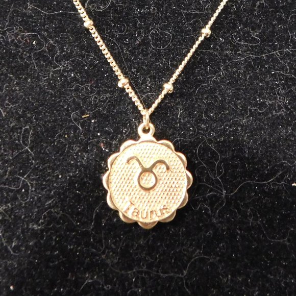 Unknown Jewelry - small taurus horoscope necklace gold tone